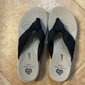 Brand new Clarks soft cushion slippers